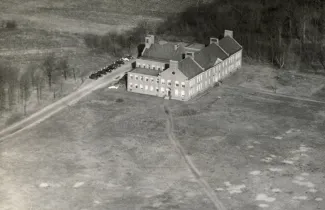 aerial view of Mason Hall in 1941, the only building in the 56-acre field that would become the main campus.