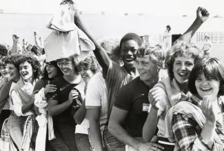 Students cheering at an event on campus