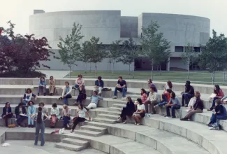students seated in the amphitheater next to Reed Library