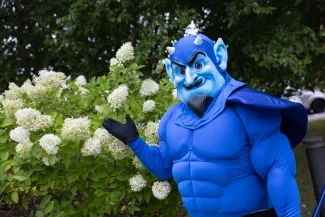 Freddy stopping to sniff the flowers